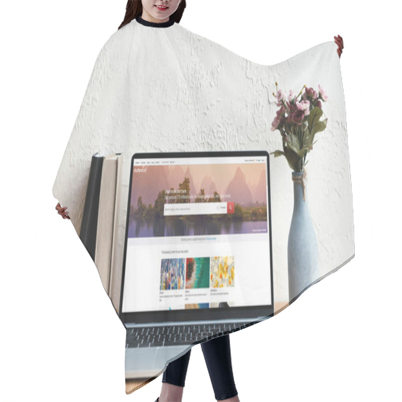 Personality  Laptop With Shutterstock Website On Screen, Books And Flowers In Vase On Wooden Table Hair Cutting Cape