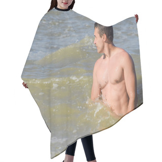 Personality  Athletic Man In Sea Water. Bathing In The Sea. A Man Is Swimming Among The Waves Of The Sea. Hair Cutting Cape