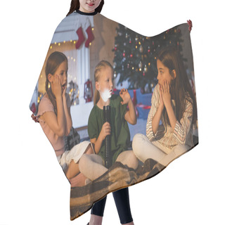 Personality  Child With Flashlight Talking Near Afraid Friends On Blanket During Christmas Celebration At Home  Hair Cutting Cape