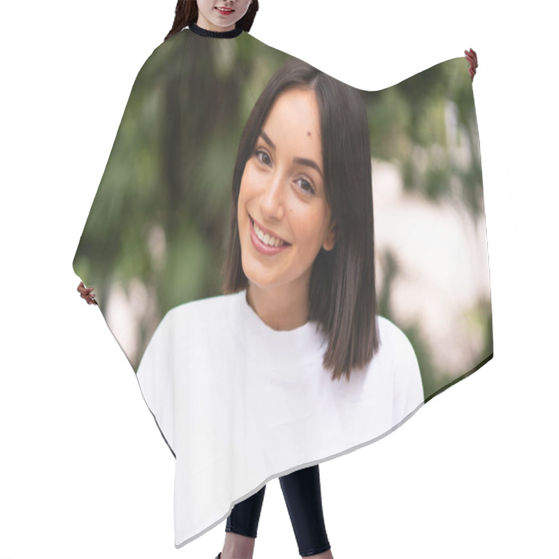Personality  Young happy caucasian woman at outdoors hair cutting cape