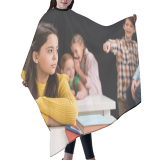 Personality  Selective Focus Of Upset Schoolgirl Near Classmates Gossiping And Pointing With Finger Isolated On Black, Bullying Concept  Hair Cutting Cape