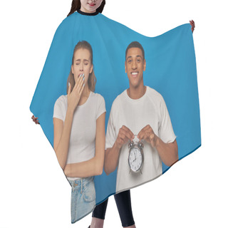 Personality  Cheerful African American Man Holding Retro Alarm Clock Near Sleepy Woman Yawning On Blue Backdrop Hair Cutting Cape