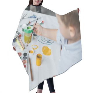 Personality  Selective Focus Of Little Boy With Brush And Paintings Drawing Picture Alone At Home Hair Cutting Cape