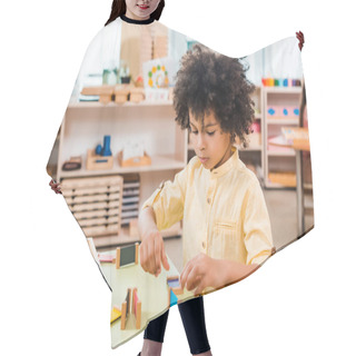 Personality  Selective Focus Of African American Kid Playing Educational Game At Table In Montessori School Hair Cutting Cape
