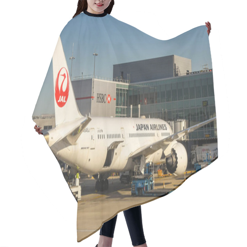 Personality  LONDON HEATHROW AIRPORT - JUNE 2018: Japan Airlines Boeing 787 Dreamliner Parked Outside Terminal 3 Of London Heathrow Airport.  Hair Cutting Cape