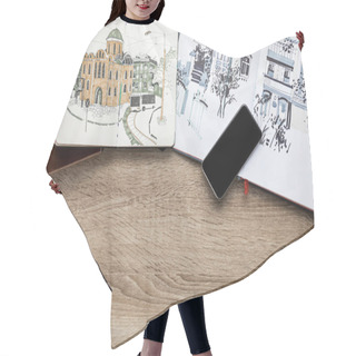 Personality  Top View Of Drawings In Albums And Smartphone On Wooden Background Hair Cutting Cape