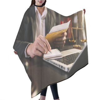 Personality  Justice And Law Concept.Male Judge In A Courtroom  The Gavel, Working With Smart Phone And Laptop And Digital Tablet Computer On Wood Table Hair Cutting Cape