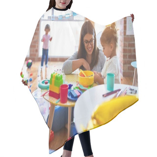 Personality  Young Beautiful Teacher And Toddlers Playing On The Table With Lots Of Toys At Kindergarten Hair Cutting Cape