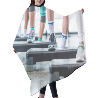 Personality  Partial View Of Sportspeople Doing Exercise On Step Platforms At Gym Hair Cutting Cape