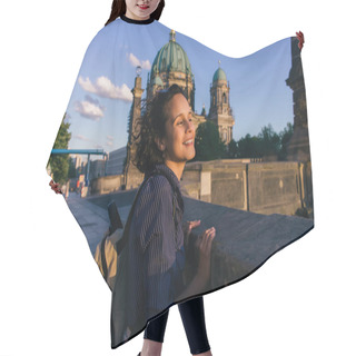 Personality  BERLIN, GERMANY - JULY 14, 2020: Joyful Young Woman Near Blurred Berlin Cathedral Hair Cutting Cape