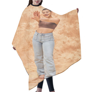 Personality  Body Positivity Movement, Jeans Look, Curvy And Joyful Woman In Crop Top Posing With Outstretched Hands On Mottled Beige Background, Casual Attire, Self-acceptance, Generation Z, Tattooed  Hair Cutting Cape