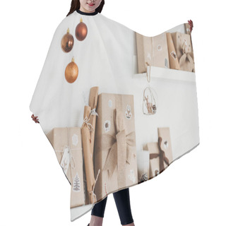 Personality  Advent Calendar Waiting For Christmas. Wrapped Gifts For Children Standing On Shelves. Seasonal Tradition. Eco Friendly Christmas Hair Cutting Cape