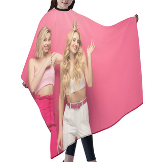Personality  Smiling Girl Pointing On Positive Blonde Friend In Crown On Pink Background Hair Cutting Cape