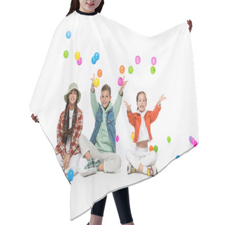Personality  Happy Preteen Kids Sitting And Throwing Colorful Balls In Air On White Hair Cutting Cape
