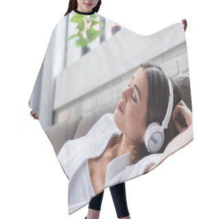 Personality  Peaceful Young Adult Woman With Closed Eyes Resting In Headphones On Couch At Home Hair Cutting Cape