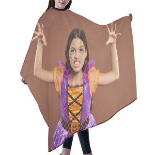Personality  Spooky Child In Halloween Costume With Spiderweb Makeup Growling And Gesturing On Brown Backdrop Hair Cutting Cape