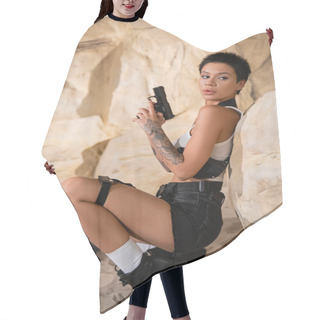 Personality  Sexy Archaeologist With Short Hair Holding Gun While Hiding Behind Rock In Cave Hair Cutting Cape