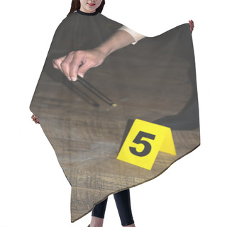 Personality  Cropped View Of Hand Examining Evidence At Crime Scene Hair Cutting Cape