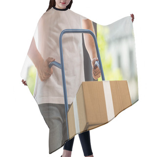 Personality  Cropped View Of Delivery Man Holding Delivery Cart With Carton Boxes  Hair Cutting Cape