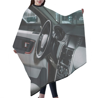 Personality  Buttons Near Black Steering Wheel In Luxury Car  Hair Cutting Cape