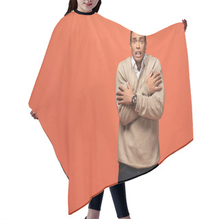 Personality  Confused Mixed Race Man In Beige Sweater Feeling Cold Isolated On Orange Hair Cutting Cape