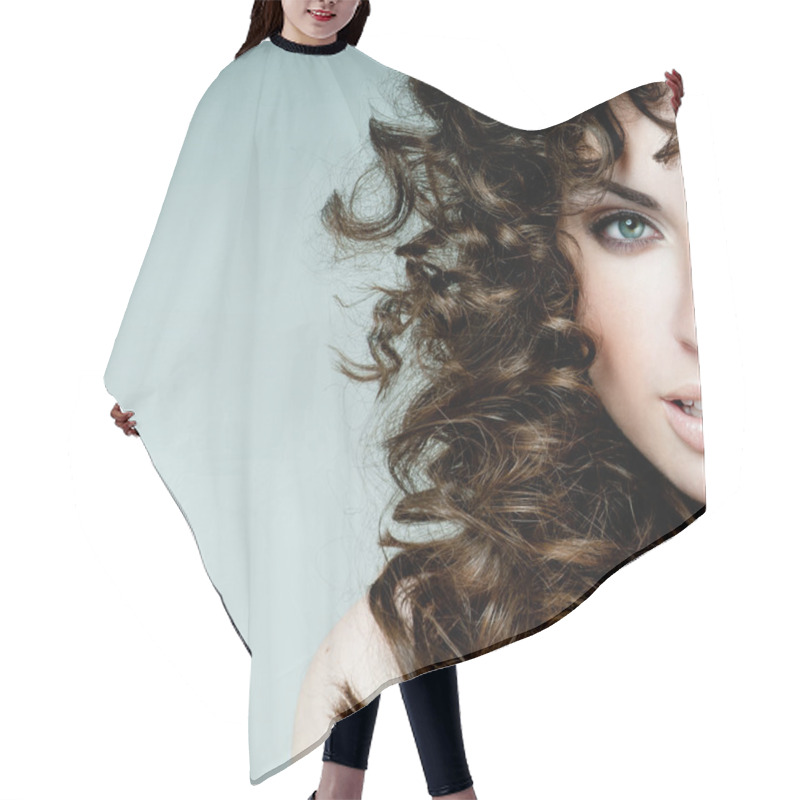 Personality  beautiful brunette with curly hair hair cutting cape