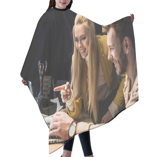 Personality  Smiling Female And Male It Specialists Using Laptop In Office Hair Cutting Cape