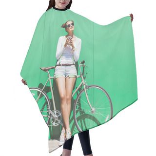 Personality  Fashionable Beautiful Young Pretty Girl In Shorts And T-shirt And Sunglasses Stands With  Bicycle Fix Gear Nex To Green Wall Bright Sunny Day Hair Cutting Cape