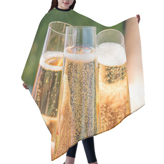 Personality  Women Drinking Wine. Three Glasses White Wine In Female Hands. Flute Glass Of Champagne With Bubbles Outdoors Isolated Against. Garden Scene Blurred In The Background. Cold Beer In Glass. Outdoor Hair Cutting Cape