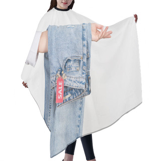 Personality  Cropped View Of Woman Holding Hanging Jeans With Sale Label Isolated On White Hair Cutting Cape