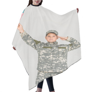 Personality  Portrait Of Boy In Camouflage Clothing Saluting While Holding American Flagpole In Hand Isolated On Grey Hair Cutting Cape