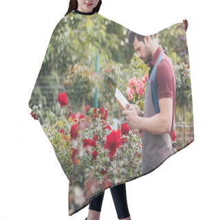 Personality  Gardener With Tablet During Work In Garden Hair Cutting Cape