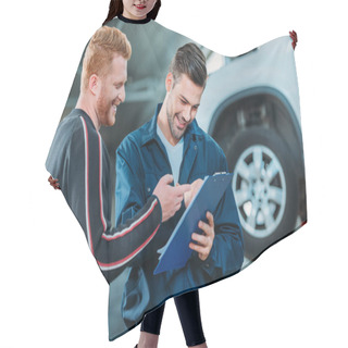 Personality  Automechanic Showing Client Clipboard Hair Cutting Cape