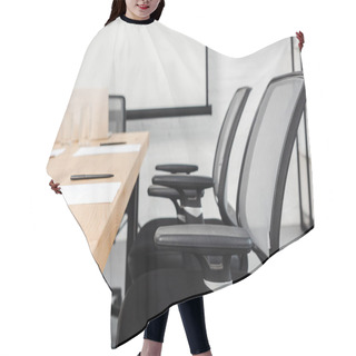 Personality  Close-up Shot Of Chair Standing At Conference Hall Of Modern Office Hair Cutting Cape