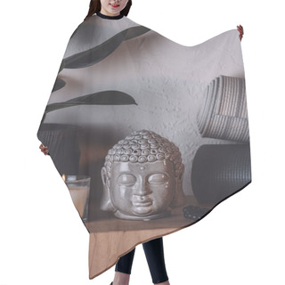 Personality  Sculpture Of Buddha Head, Burning Candle And Yoga Mats On Wooden Shelf  Hair Cutting Cape