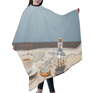 Personality  Selective Focus Of Coffee Cup, Compass And Toy Ship In Glass Bottle On Map With Copy Space Hair Cutting Cape