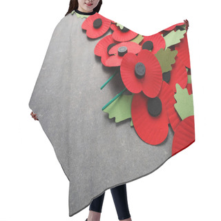 Personality  World War Remembrance Day. Red Paper Poppies On Dark Stone Background. Hair Cutting Cape