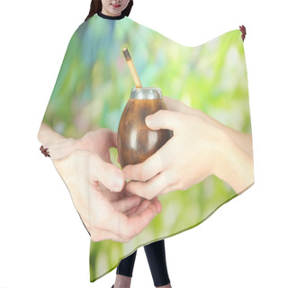 Personality  Woman Hands Giving Calabash And Bombilla With Yerba Mate, On Nature Background Hair Cutting Cape