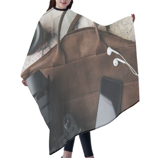 Personality  Top View Of Brown Leather Bag With Photo Camera, Lens, Smartphone And Earphones On Map Hair Cutting Cape