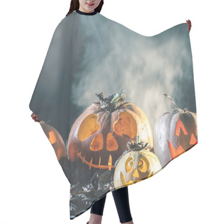 Personality  Halloween Pumpkins At Wood Background. Carved Scary Faces Of Pumpkin. Hair Cutting Cape