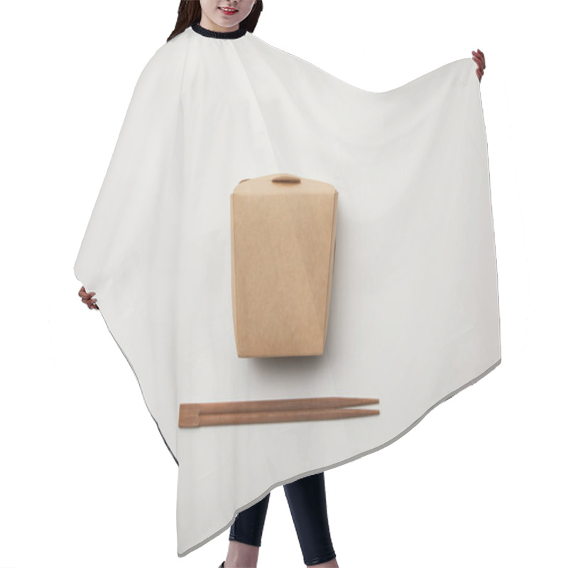 Personality  Elevated View Of Arranged Chopsticks And Noodle Box On White Surface, Minimalistic Concept  Hair Cutting Cape