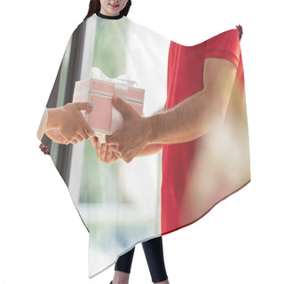 Personality  Cropped View Of Delivery Man Giving Pink Present To Woman  Hair Cutting Cape