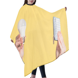 Personality  Cropped View Of Woman Holding Fluorescent Lamp And Wallet In Hands Isolated On Yellow, Energy Efficiency Concept Hair Cutting Cape