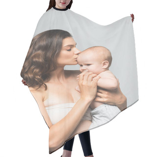 Personality  Portrait Of Attractive Mother Kissing Baby Boy, Isolated On Grey Hair Cutting Cape
