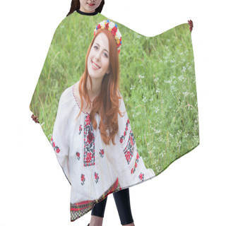 Personality  Redhead Girl In Nationac Ukrainian Clothes On The Green Grass. Hair Cutting Cape