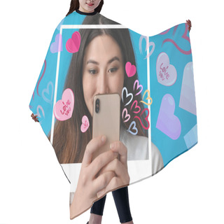Personality  Beautiful Young Asian Blogger With Mobile Phone On Blue Background. Valentine's Day Celebration Hair Cutting Cape