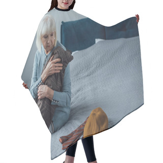 Personality  Upset Senior Woman Sitting On Bed And Holding Jacket At Home Hair Cutting Cape