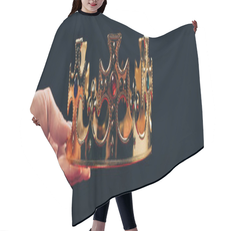 Personality  cropped view of woman holding golden crown with gemstones, isolated on black, panoramic shot hair cutting cape