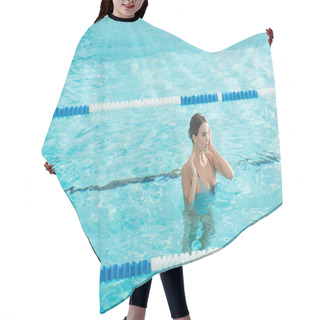 Personality  Young Woman In Swimsuit Standing In Pool With Rippled Water  Hair Cutting Cape