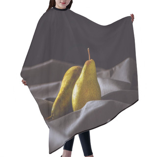 Personality  Close-up Shot Of Ripe Yellow Pears On Grey Drapery On Black Hair Cutting Cape
